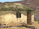 Rendering of the so-called Harland Village (remains of several buildings uncovered during James Harland’s 1927-1928 excavation seasons and dated to the Early Bronze Age III period) in trench EU5 at Tsoungiza; © 1998 Learning Sites, Inc.