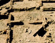 Photograph showing most of trench EU7, focusing on the remains of the West House; © 1987 Nemea Valley Archaeological Project.