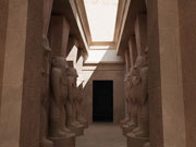 Rendering from the 3D computer model showing the line of large Bes statues in hypostyle hall court leading into the main rooms of the Temple of Mut; ©2003 Learning Sites, Inc.