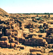 View northeast over the remains of the porch of Temple B700; ©1985 Timothy Kendall, used with permission.