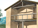 Exterior rendering of the Early Bronze Age House A (trench EU5), showing remnants of pits from previous periods; © 1998 Learning Sites, Inc.